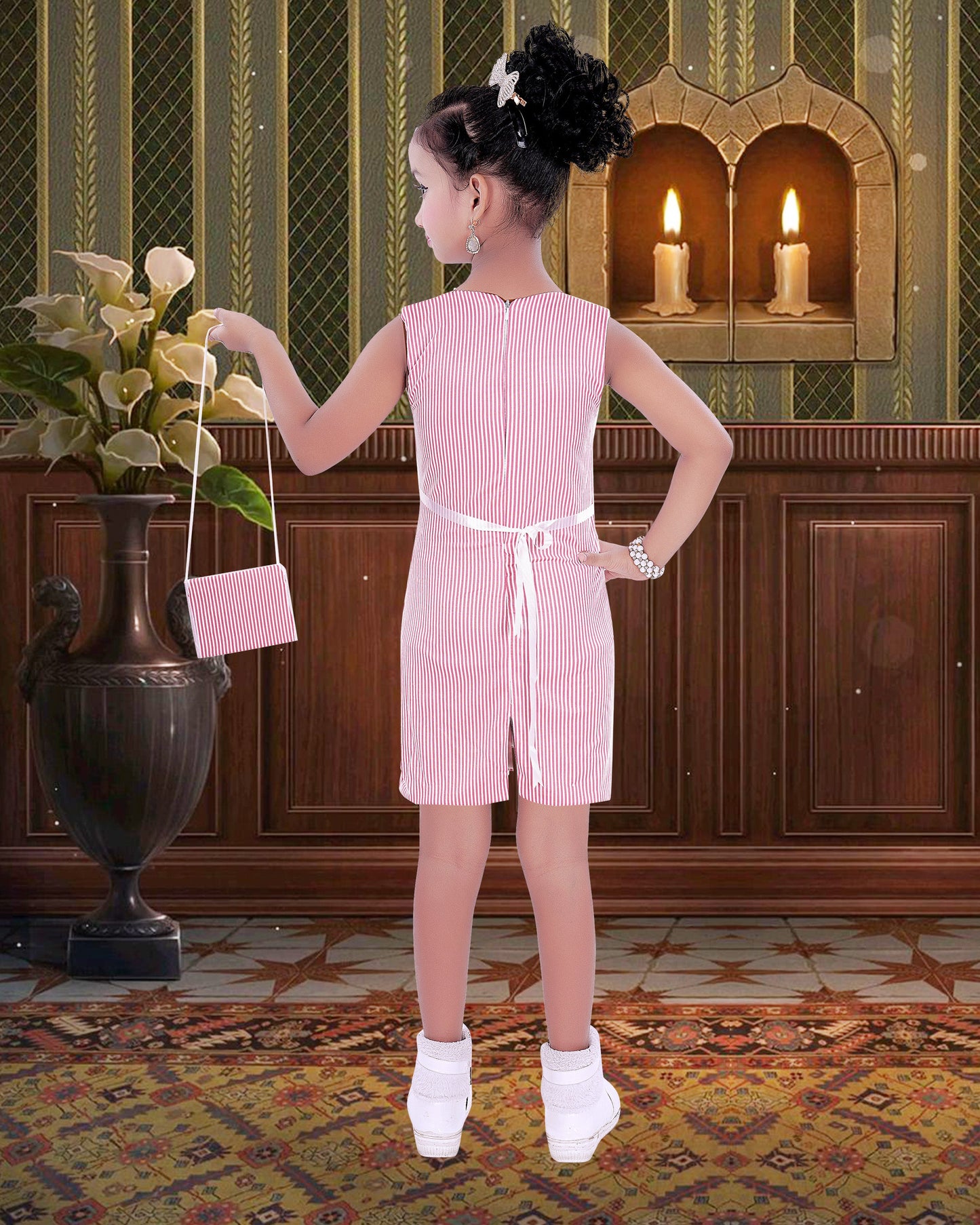 Pink coloured Cotton Blend Bow Frock With Purse For Girls.