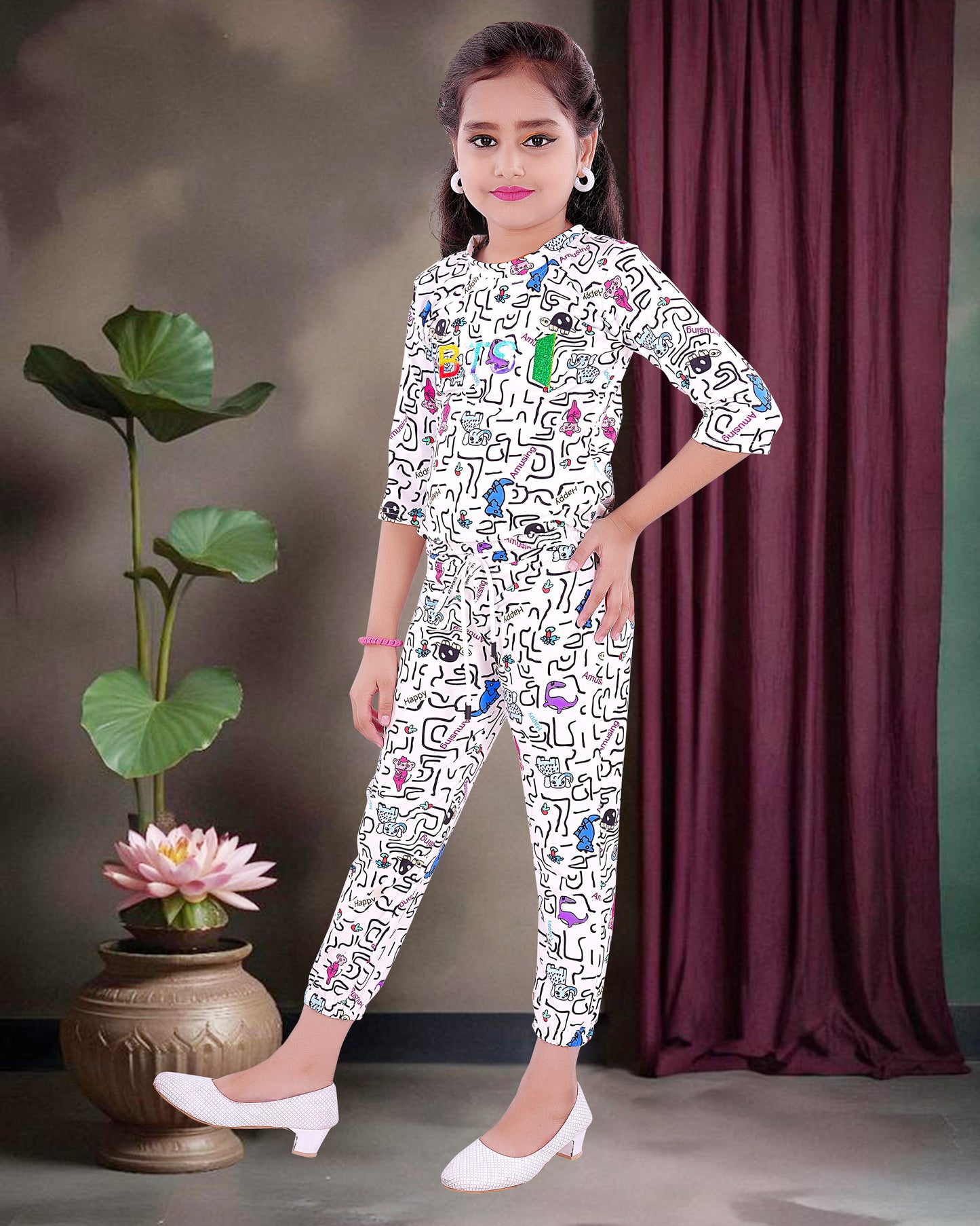 Multi Colored Print With White Background Cotton Blend Top & Bottom For Girls.