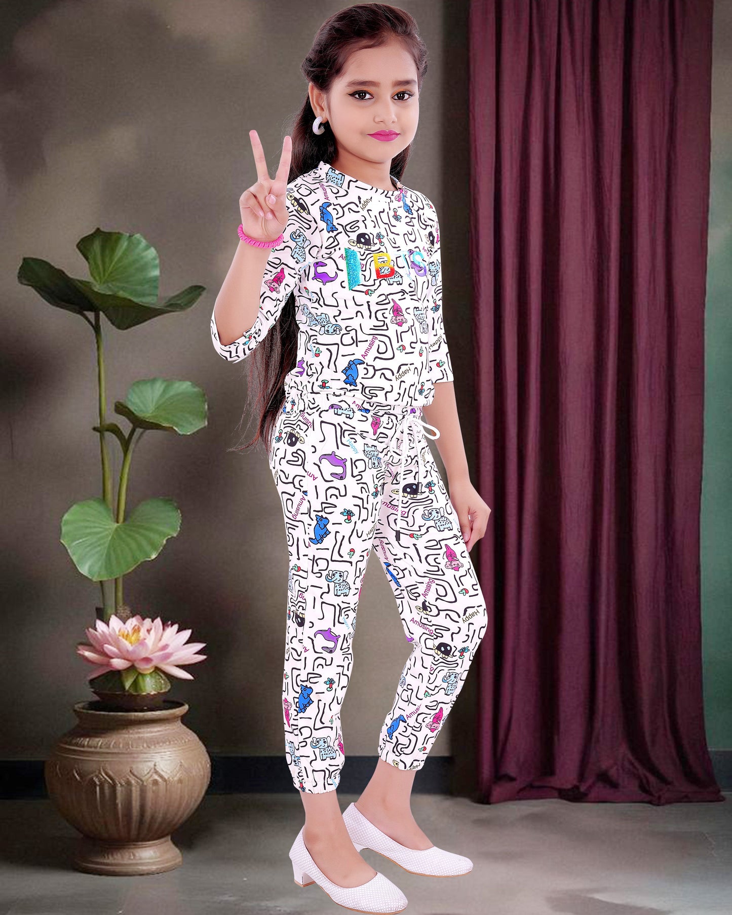 Multi Colored Print With White Background Cotton Blend Top & Bottom For Girls.