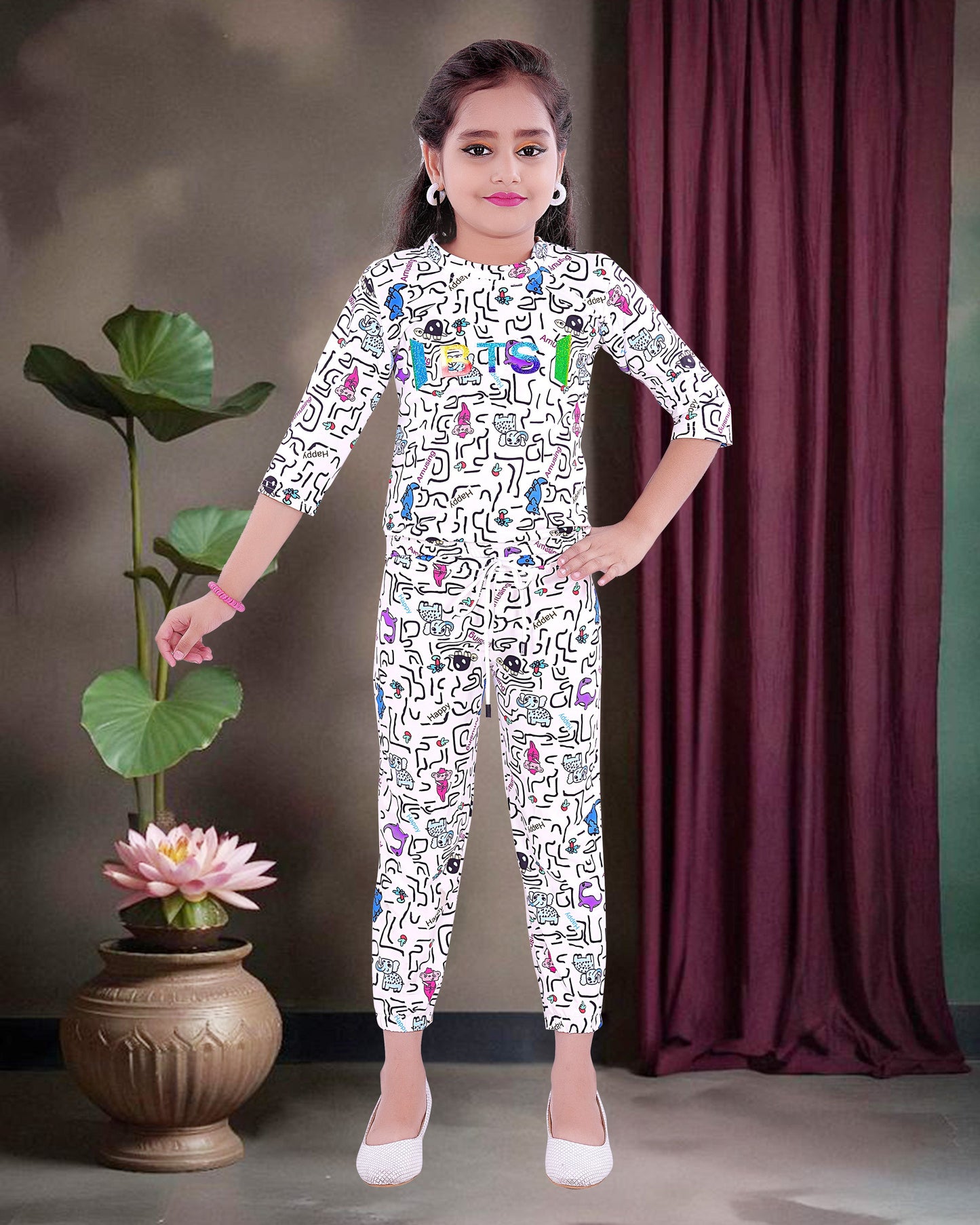 Multi Colored Print  With White Background  Cotton Blend  Top & Bottom For Girls.